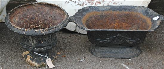 2 black painted cast iron planters(-)